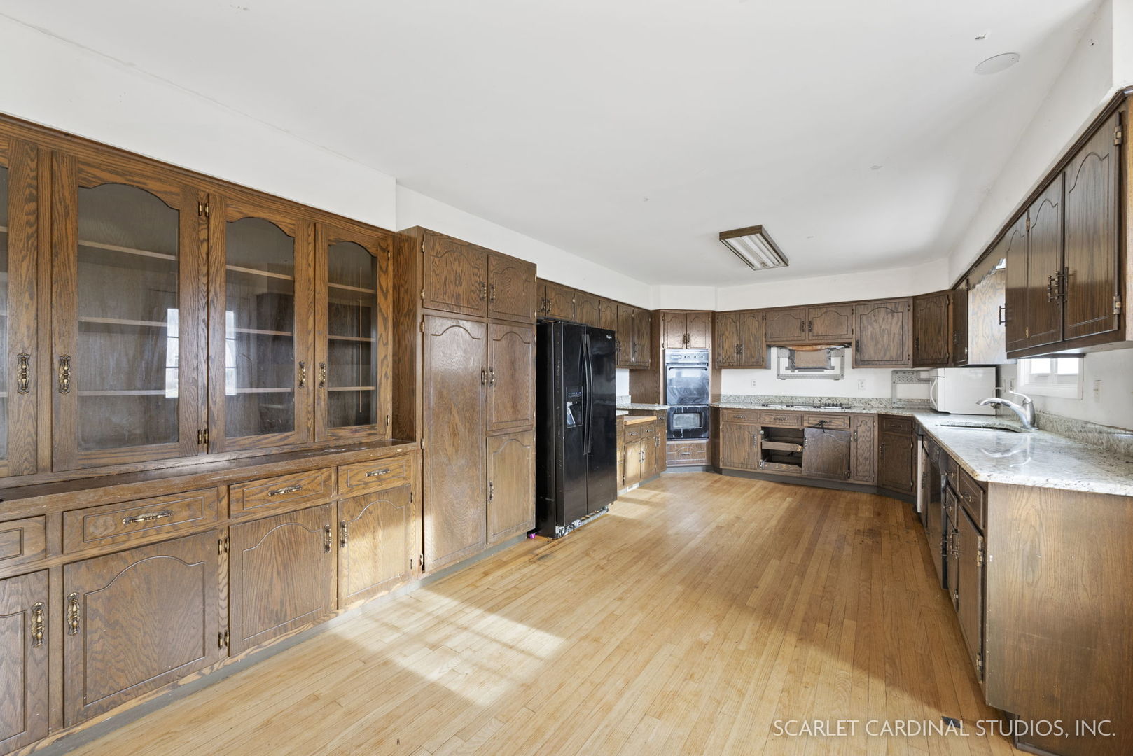 2151 Sheffer Road Aurora, IL 60502 - Photo 5 of 16 a large kitchen with cabinets and stainless steel appliances
