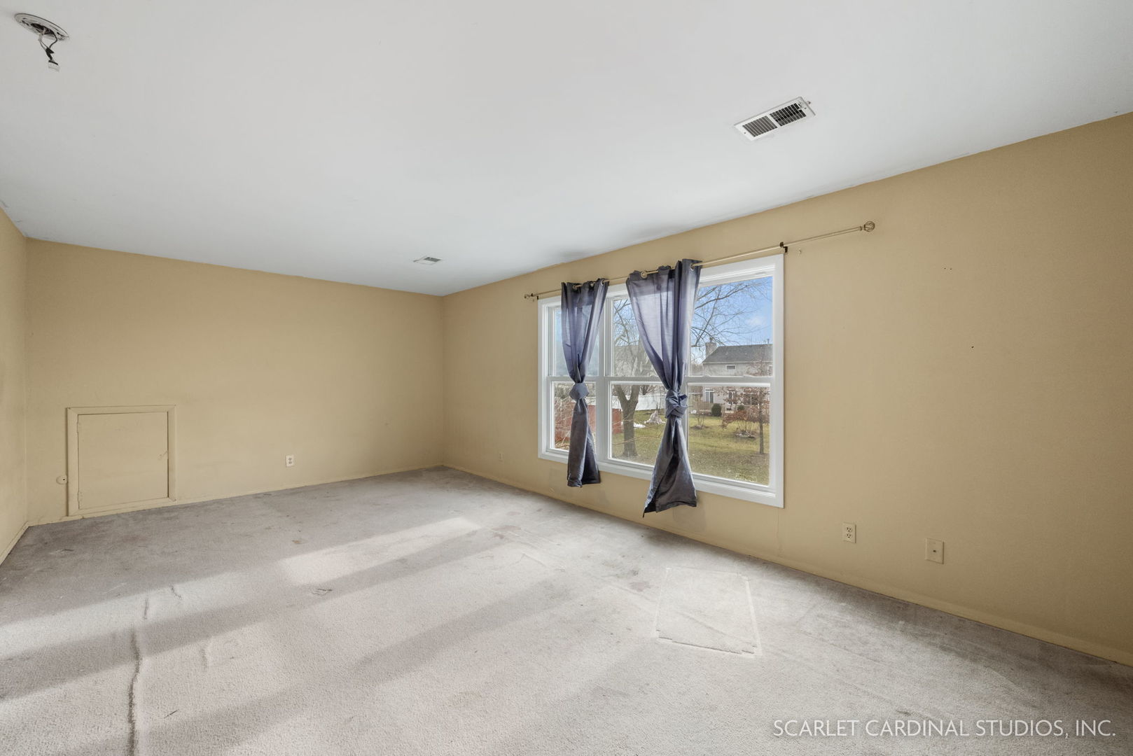 2151 Sheffer Road Aurora, IL 60502 - Photo 8 of 16 a view of an empty room with a window
