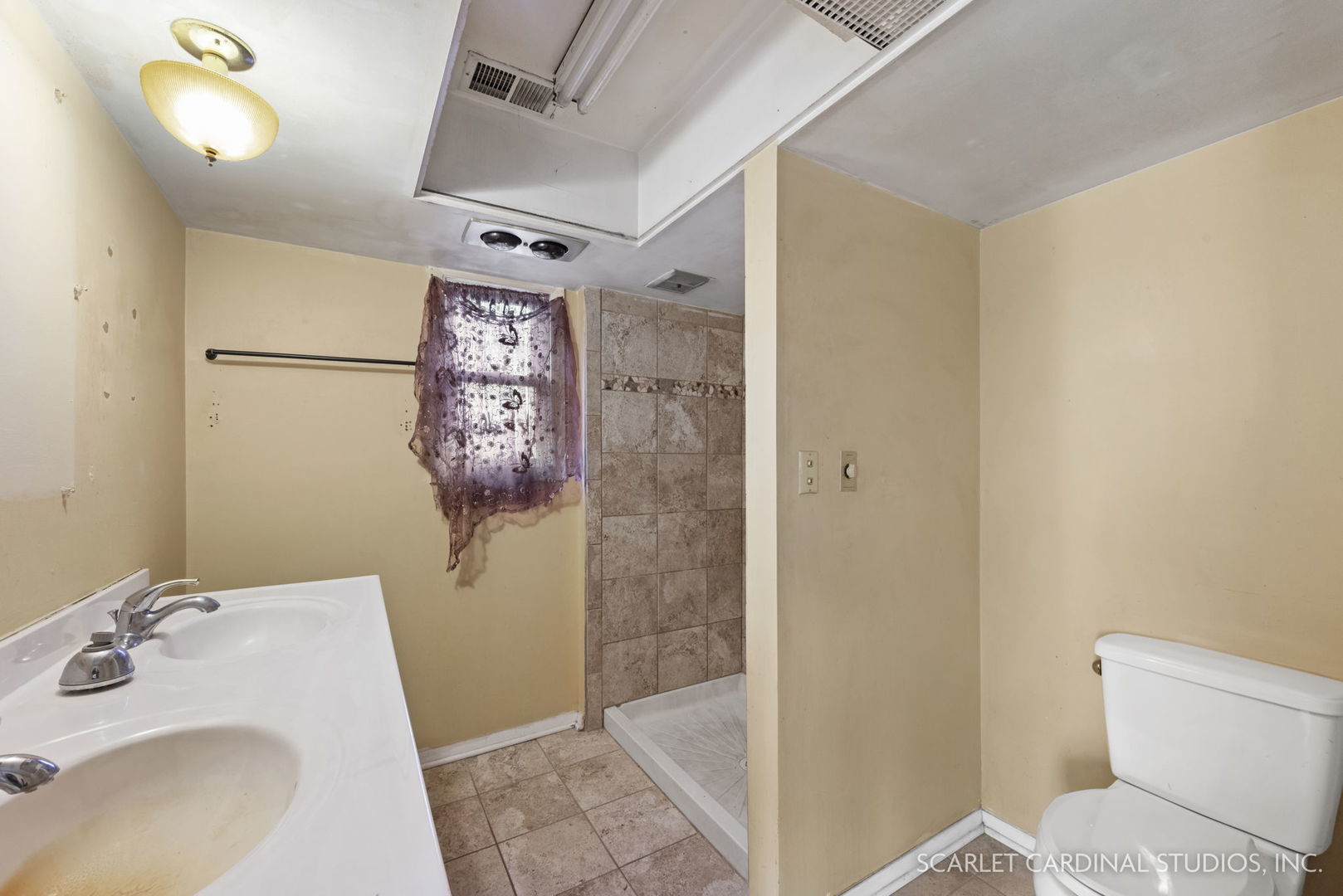 2151 Sheffer Road Aurora, IL 60502 - Photo 10 of 16 a bathroom with a sink and mirror with toilet