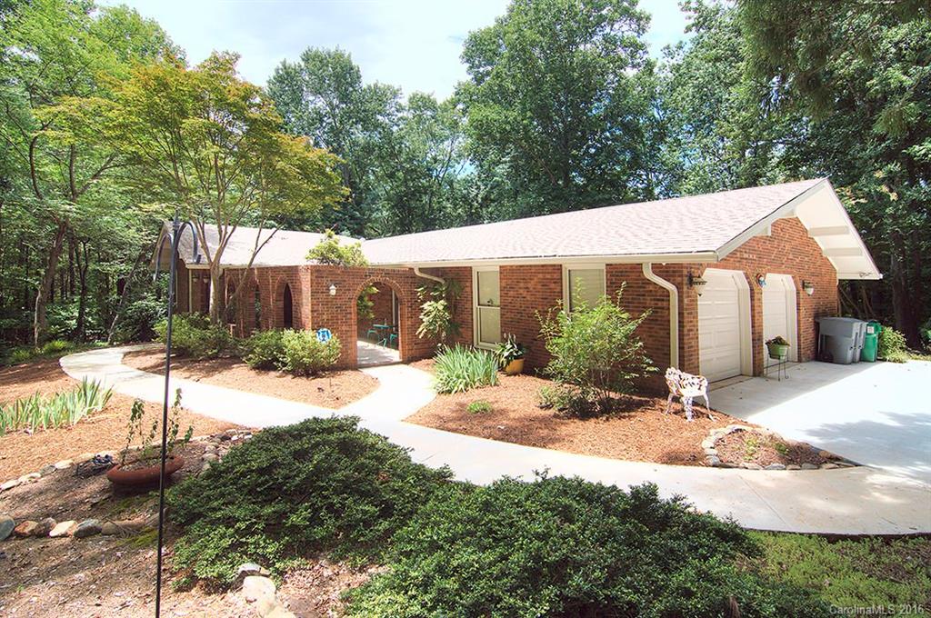 3001 Planters Ridge Road Charlotte, NC 28270 - Photo 1 of 24 a view of a house with a yard and sitting area