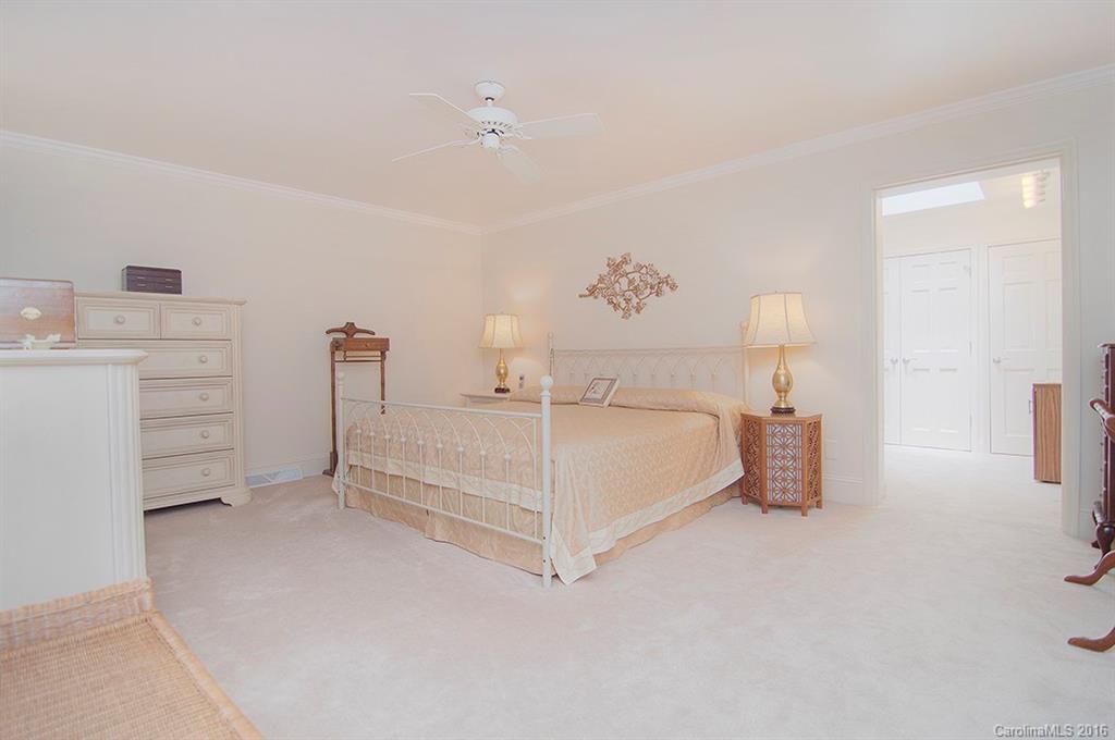3001 Planters Ridge Road Charlotte, NC 28270 - Photo 15 of 24 a bed room with a bed and a night stand