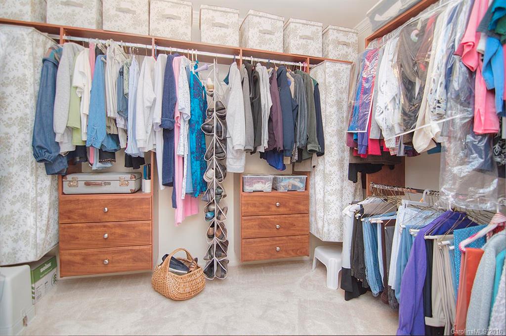 3001 Planters Ridge Road Charlotte, NC 28270 - Photo 17 of 24 a view of walk in closet with clothes