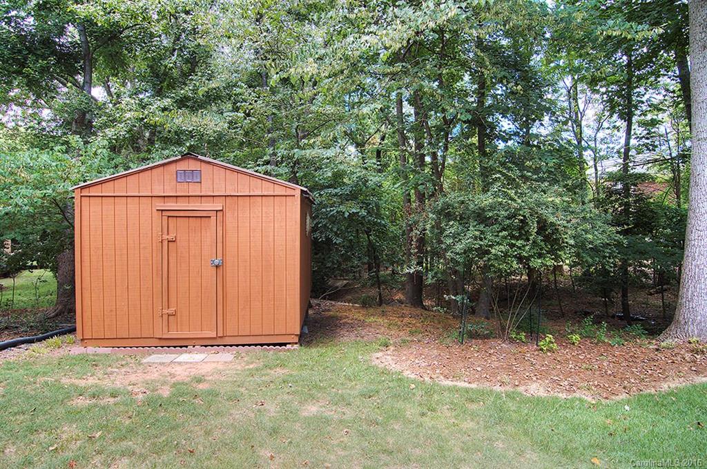 3001 Planters Ridge Road Charlotte, NC 28270 - Photo 4 of 24 a front view of a house with a yard