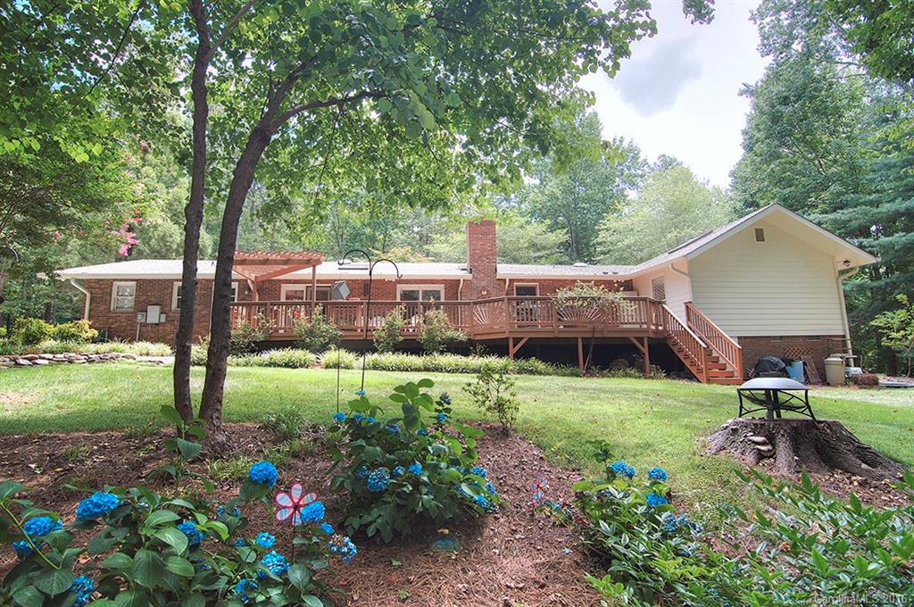 3001 Planters Ridge Road Charlotte, NC 28270 - Photo 5 of 24 a view of a backyard with garden and plants