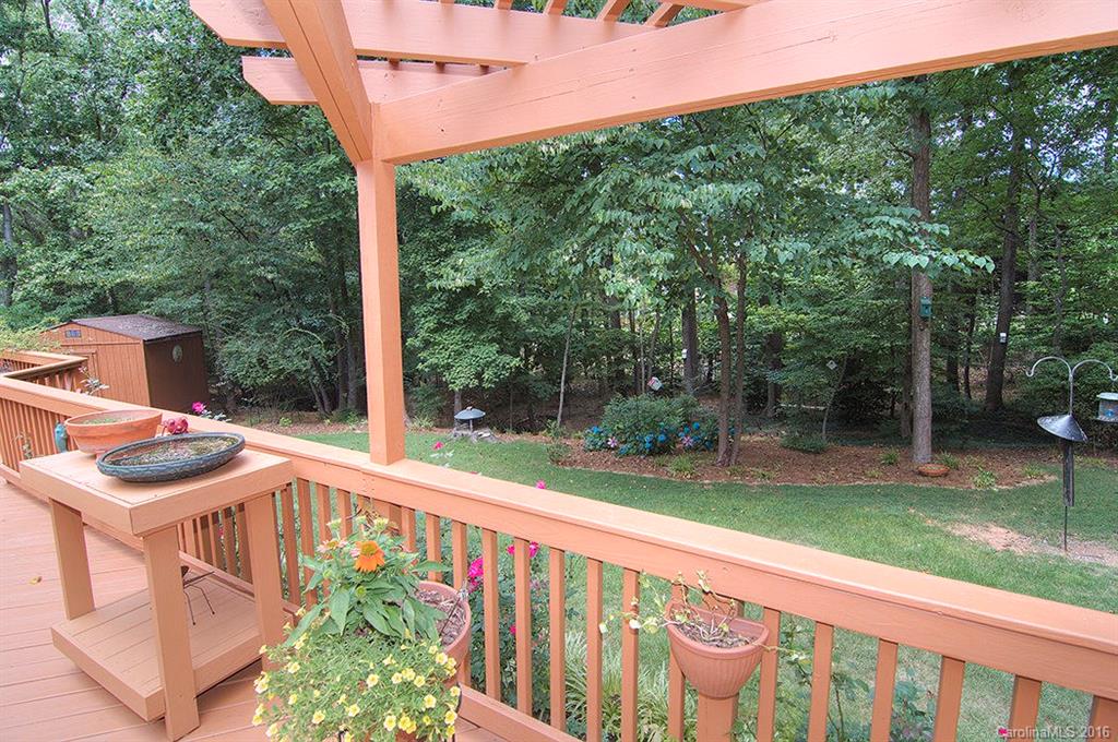 3001 Planters Ridge Road Charlotte, NC 28270 - Photo 7 of 24 a view of a balcony with a garden