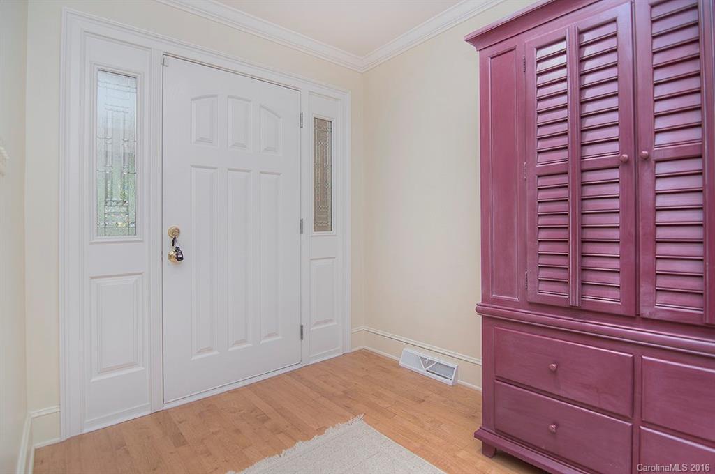 3001 Planters Ridge Road Charlotte, NC 28270 - Photo 8 of 24 a view of a bedroom with wooden floor