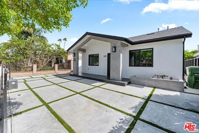 a house view with a outdoor space
