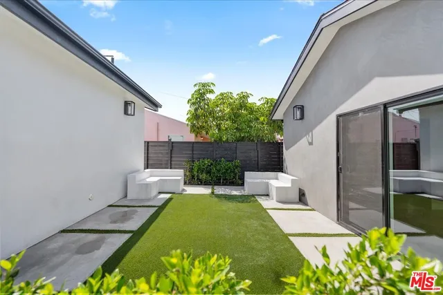 a view of yard from a corridor