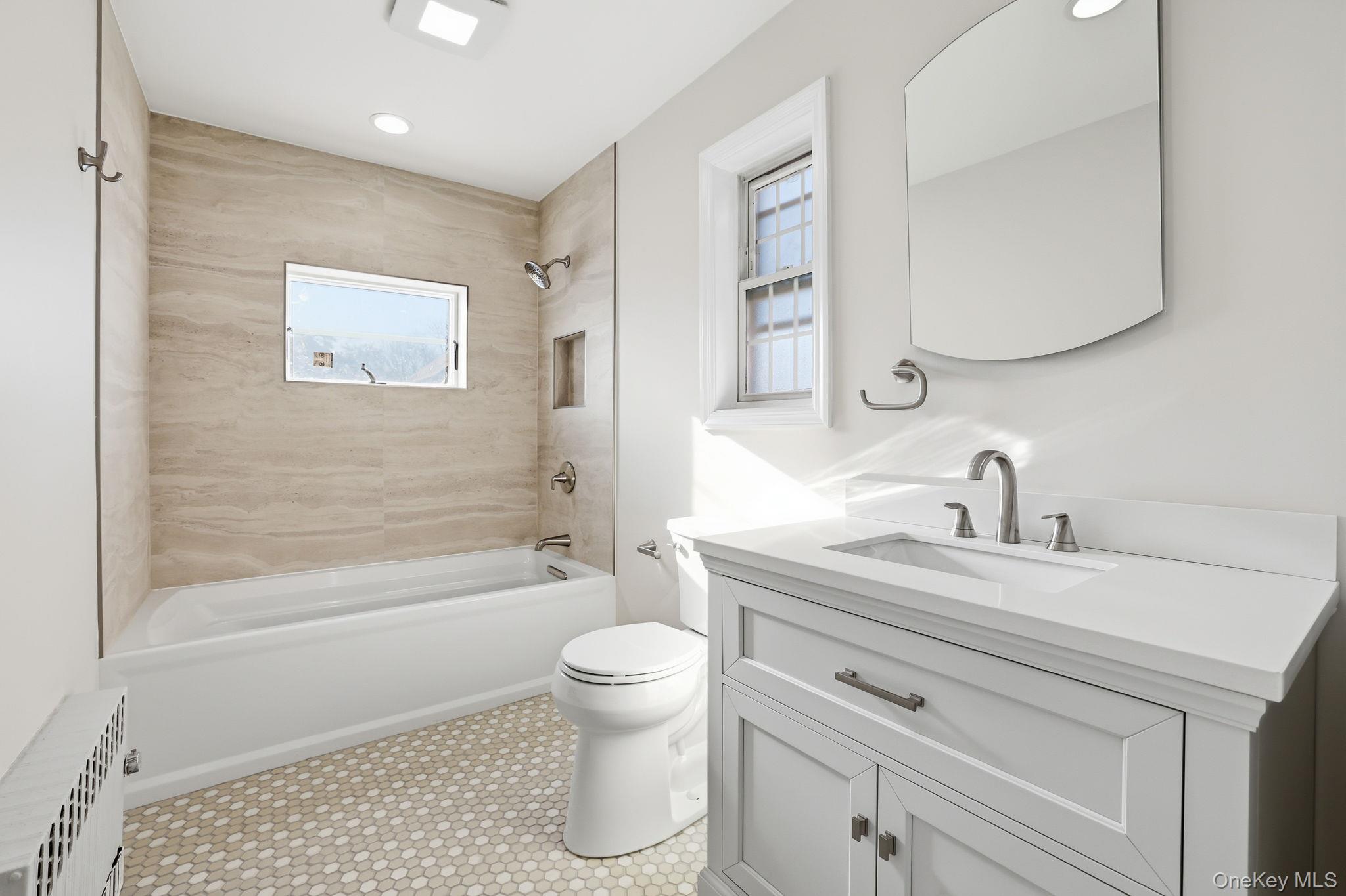 2015 Tenbroeck Avenue Bronx, NY 10461 - Photo 19 of 50 a bathroom with a sink a toilet and shower