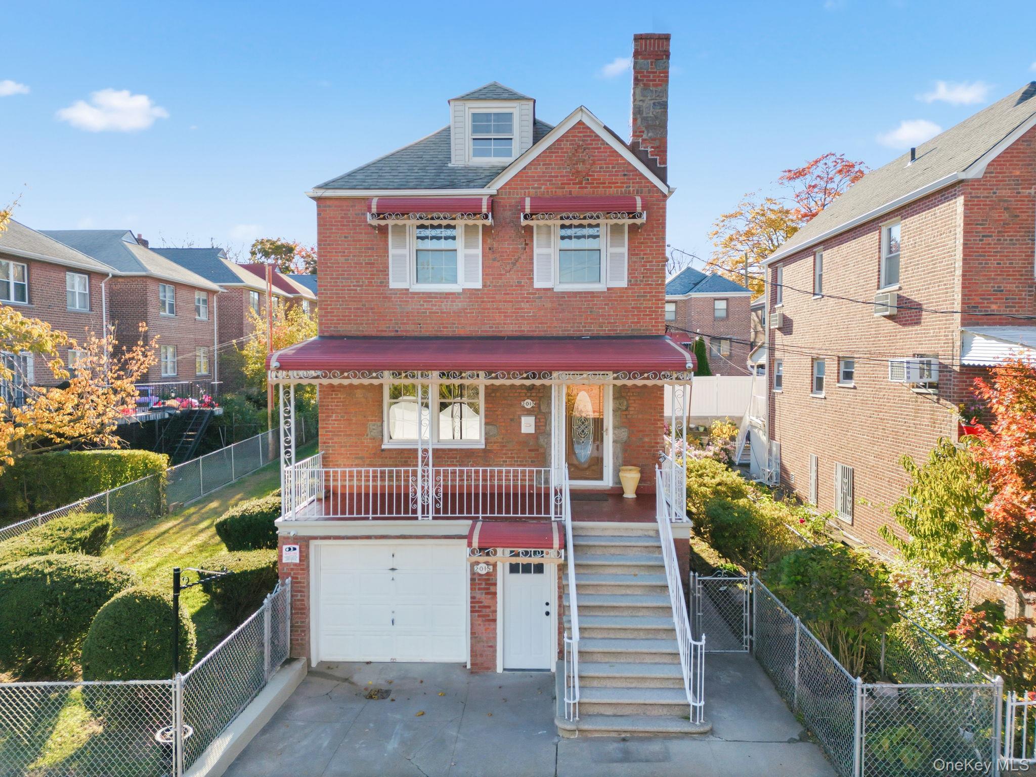 2015 Tenbroeck Avenue Bronx, NY 10461 - Photo 44 of 50 a front view of a house with a porch