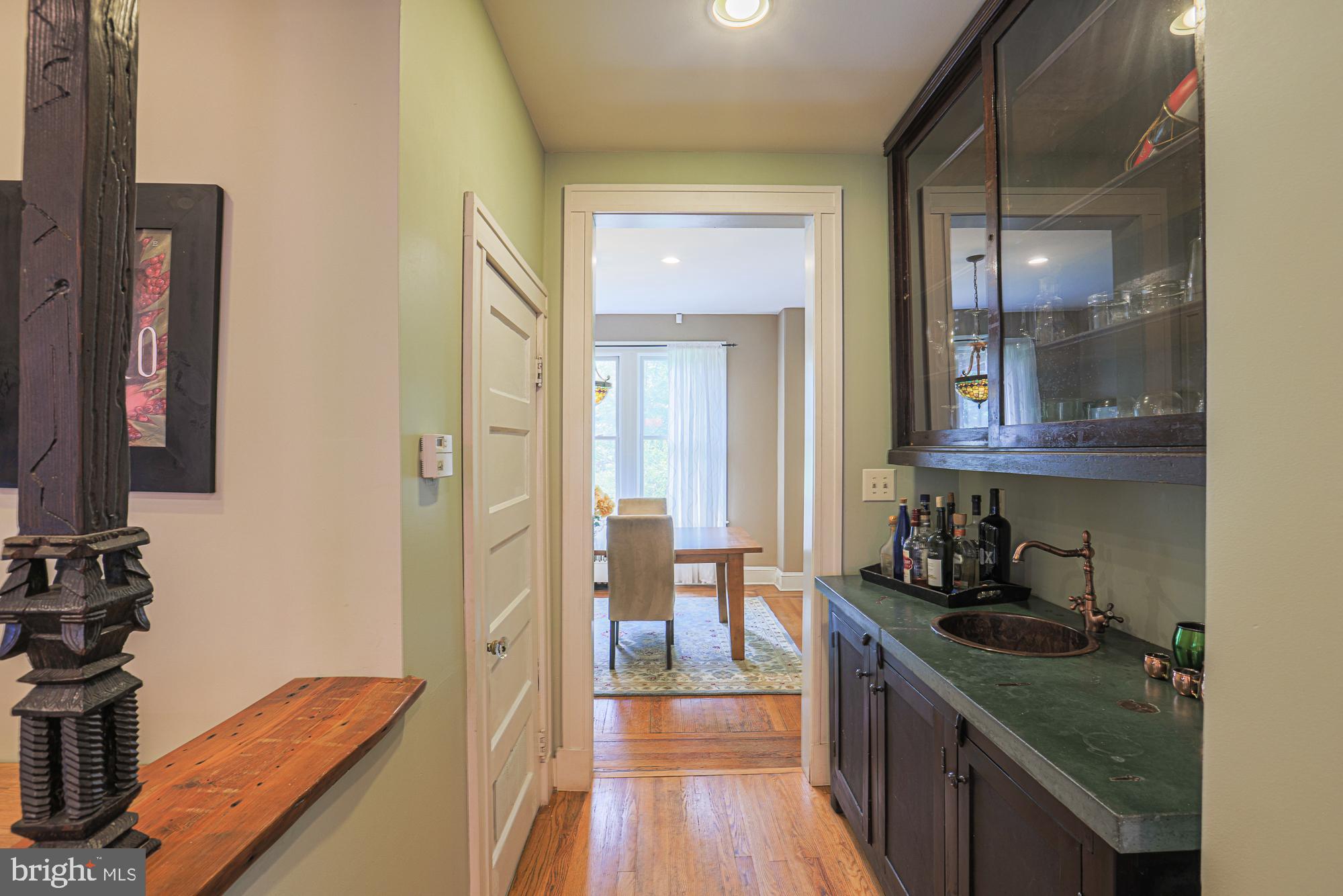 2304 Ken Oak Road Baltimore, MD 21209 - Photo 20 of 63 Wet bar nook with 1/2 bath across from it
