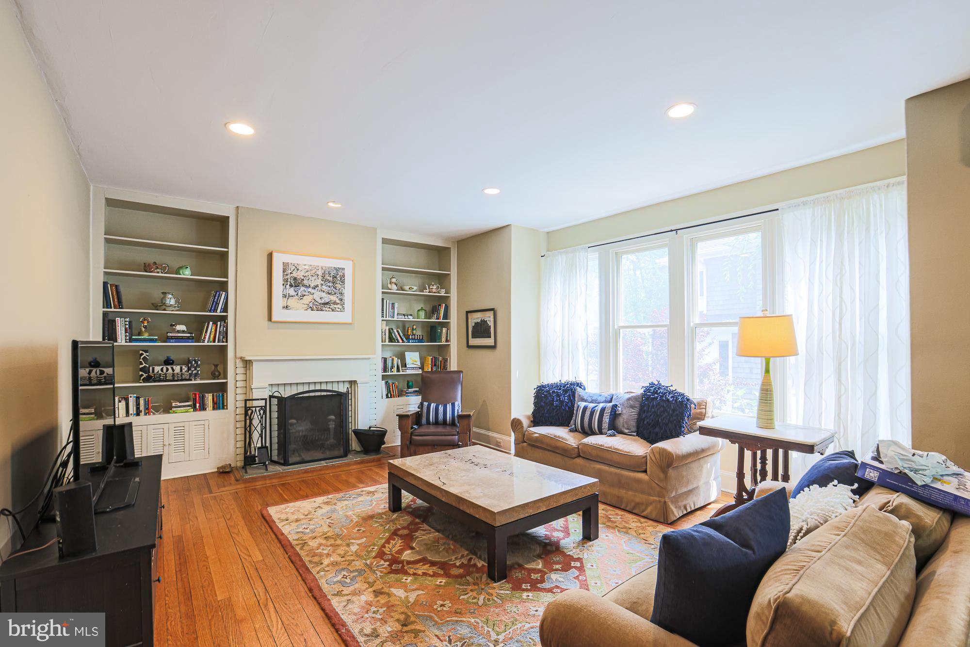 2304 Ken Oak Road Baltimore, MD 21209 - Photo 10 of 63 Spacious family room with built ins and fire place