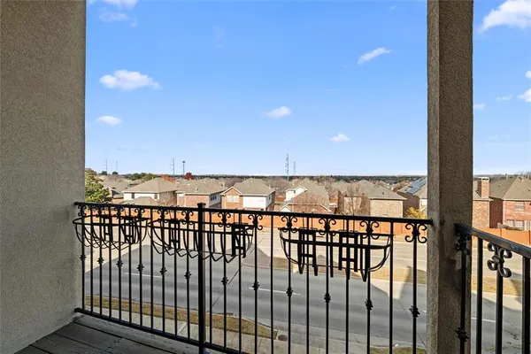 a view of a balcony with an outdoor space