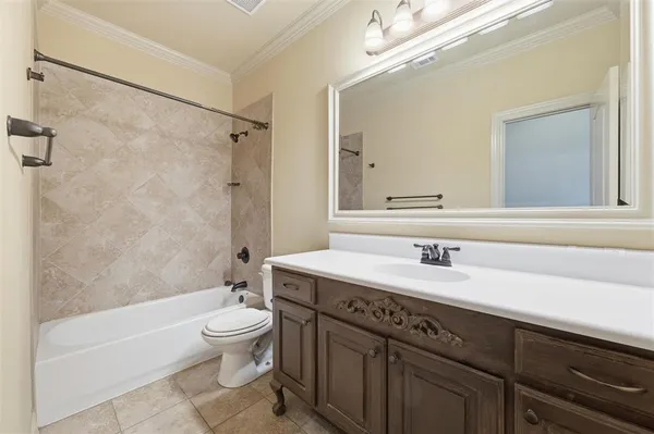 a bathroom with a sink a toilet and a bathtub