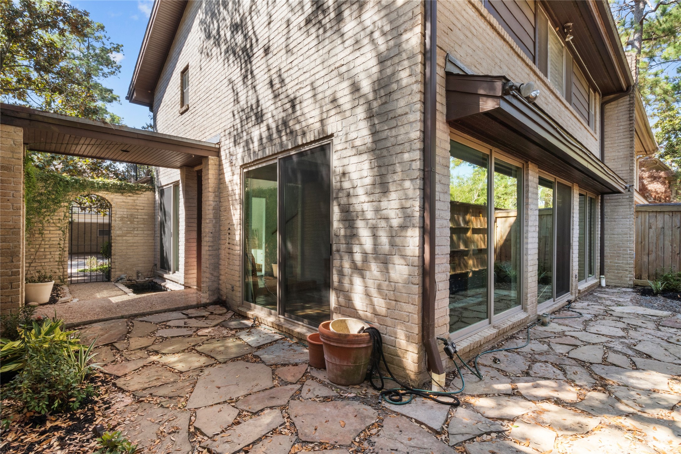 201 Vanderpool Lane, Unit 103 Houston, TX 77024 - Photo 5 of 28 a view of a entrance door of the house