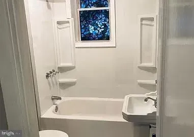 a bathroom with a bathtub