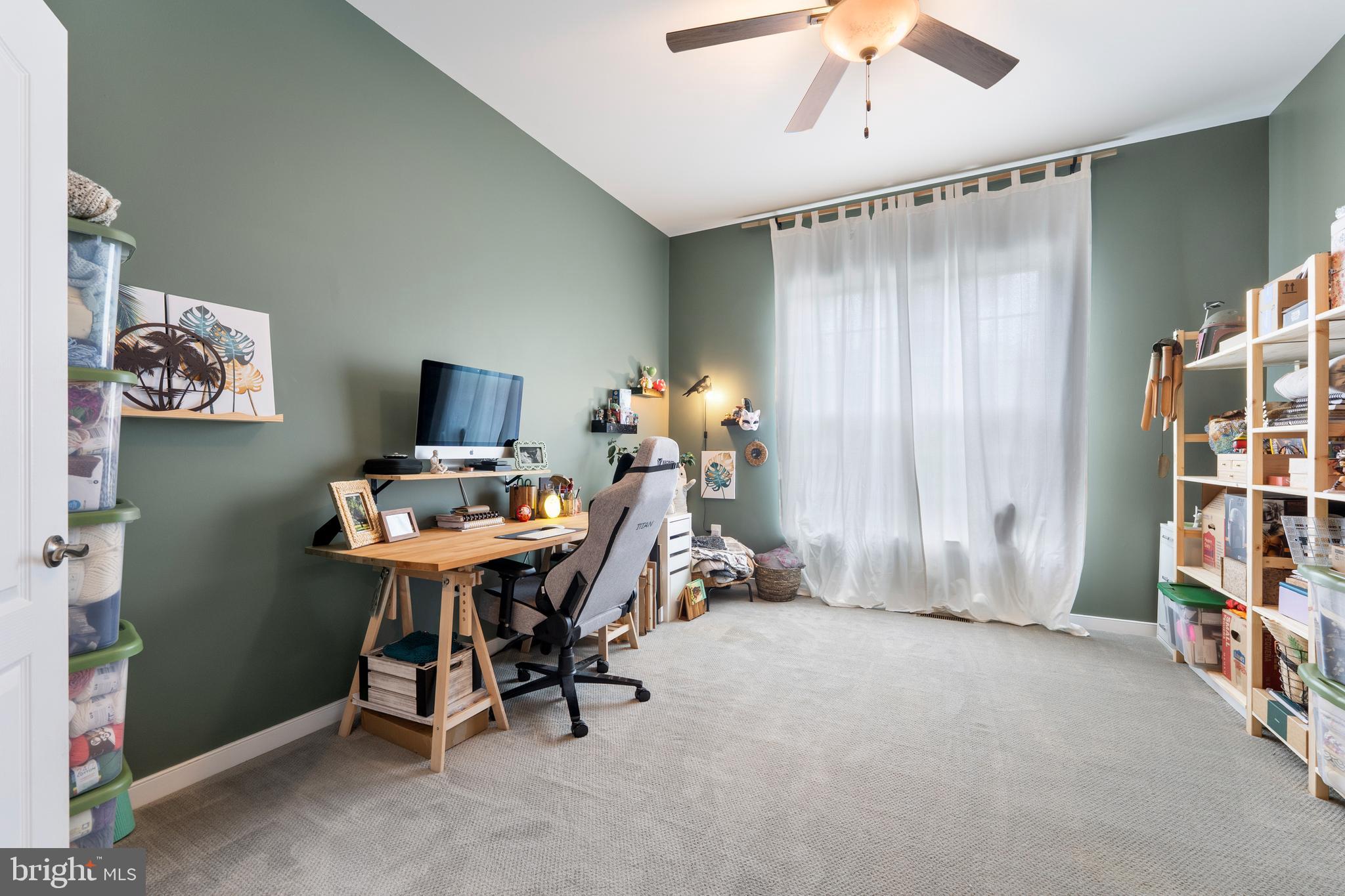80 Shackelford Well Road Fredericksburg, VA 22406 - Photo 36 of 108 a view of a workspace with furniture and a window