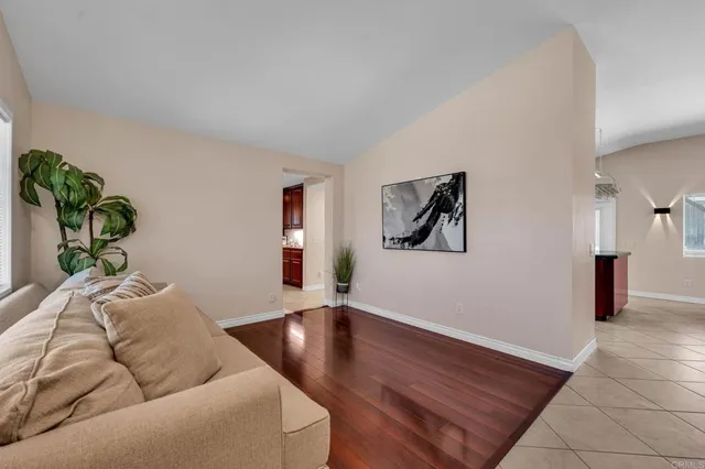 a view of a dining room with furniture and window