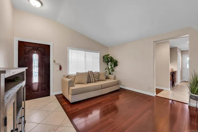 a large kitchen with stainless steel appliances granite countertop a lot of counter space and a sink