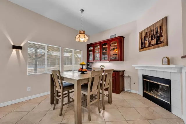 a kitchen with stainless steel appliances granite countertop a refrigerator a sink and a stove