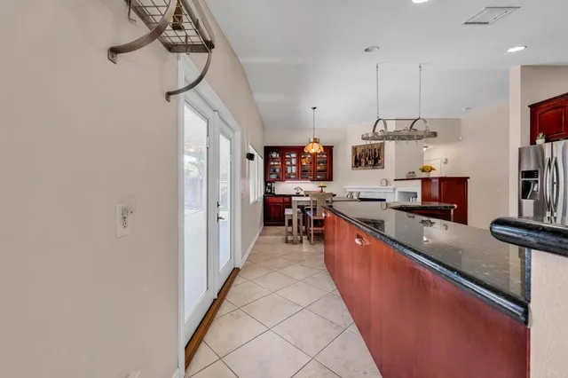 a workspace with furniture window and wooden floor