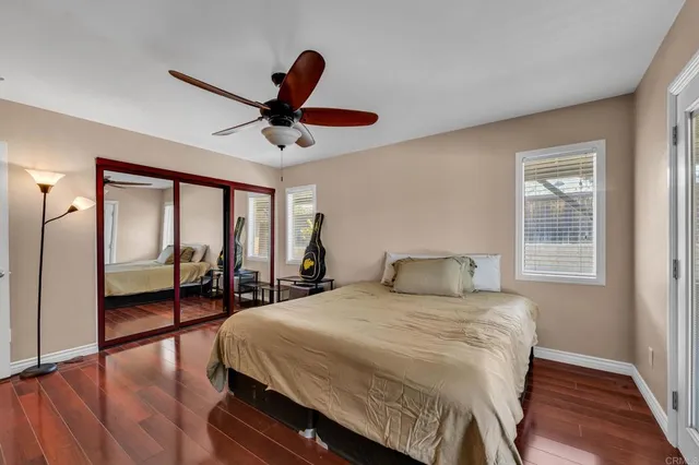 a white toilet sitting next to a bathroom sink