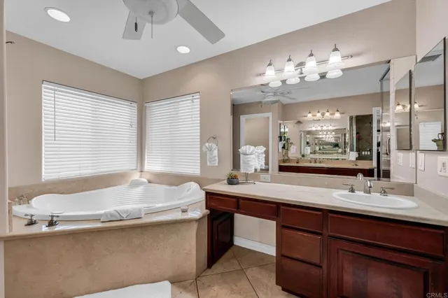 an aerial view of residential houses and outdoor space