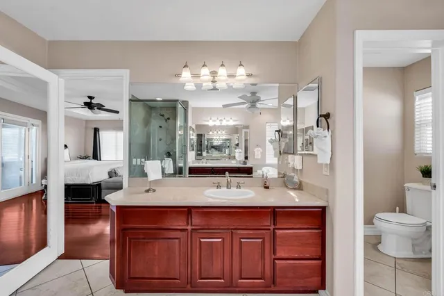 an aerial view of residential house with outdoor space and parking