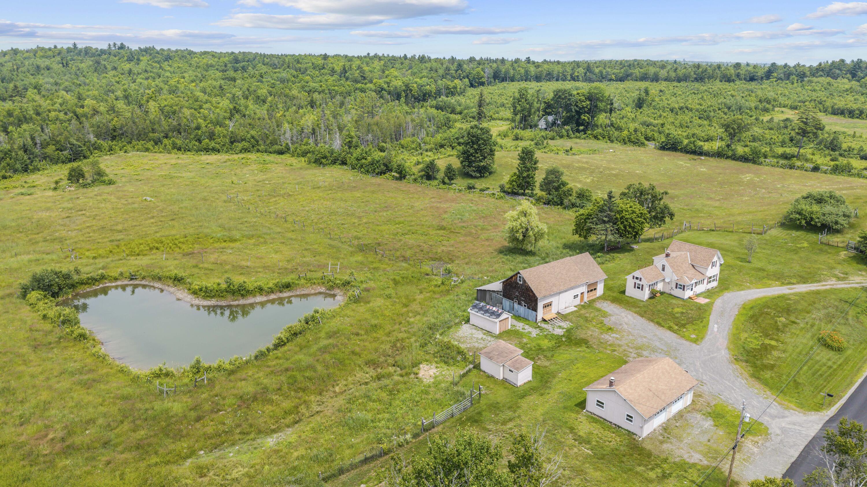232 Wharff Road Guilford, ME 04443 - Photo 4 of 65 DJI_20260707122639_0048_D