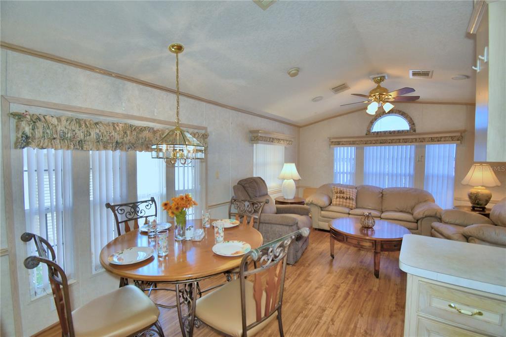 251 Patterson Road, Unit H17 Haines City, FL 33844 - Photo 15 of 47 a view of a dining room with furniture window and outside view