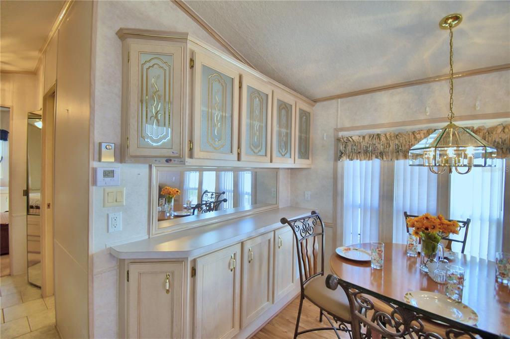 251 Patterson Road, Unit H17 Haines City, FL 33844 - Photo 16 of 47 a kitchen with stainless steel appliances granite countertop a sink and a refrigerator