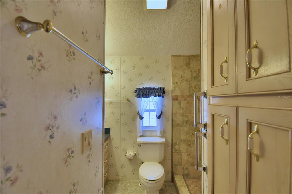 251 Patterson Road, Unit H17 Haines City, FL 33844 - Photo 19 of 47 a bathroom with a shower