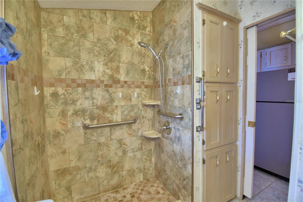 251 Patterson Road, Unit H17 Haines City, FL 33844 - Photo 21 of 47 a bathroom with a shower