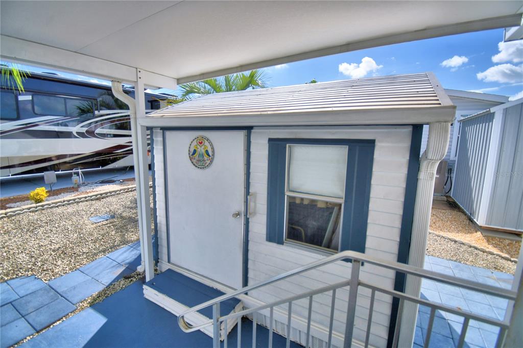 251 Patterson Road, Unit H17 Haines City, FL 33844 - Photo 32 of 47 a view of storage and utility room