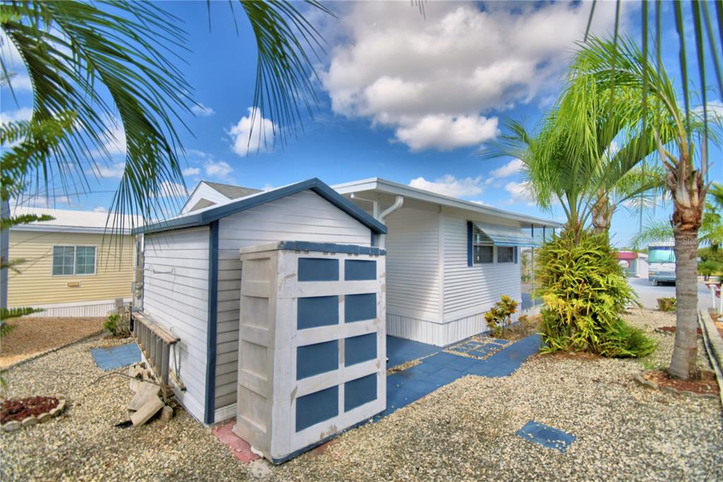 251 Patterson Road, Unit H17 Haines City, FL 33844 - Photo 35 of 47 a view of a house with a yard