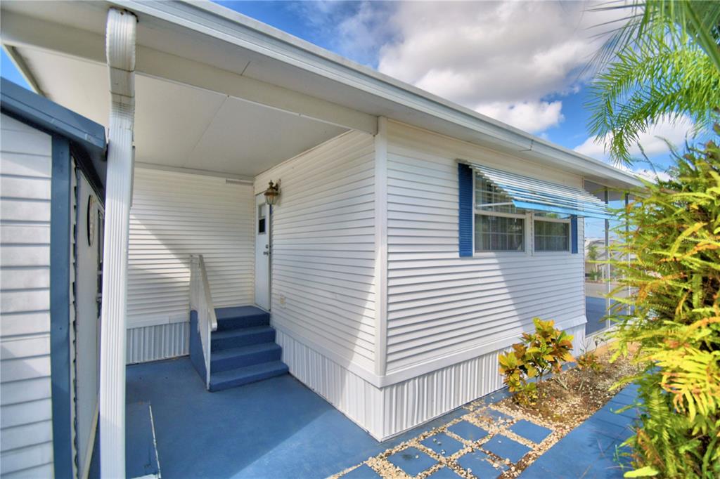 251 Patterson Road, Unit H17 Haines City, FL 33844 - Photo 36 of 47 a view of a house with a balcony