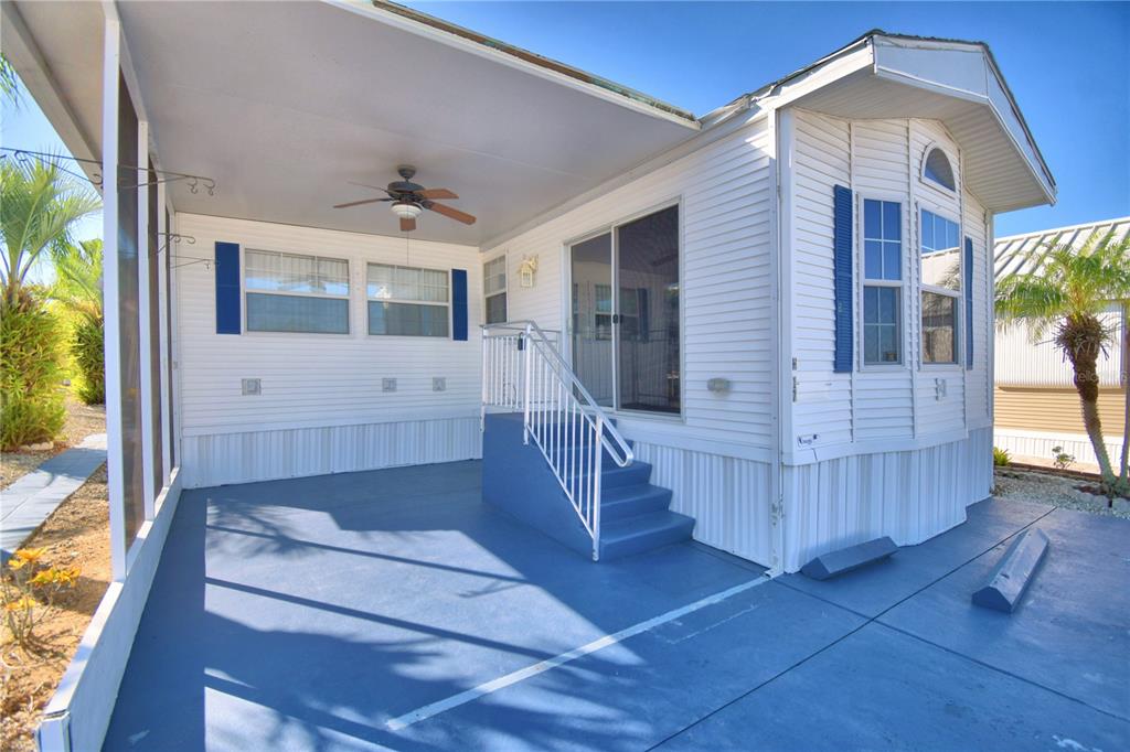 251 Patterson Road, Unit H17 Haines City, FL 33844 - Photo 5 of 47 a view of a house with wooden floor and a window