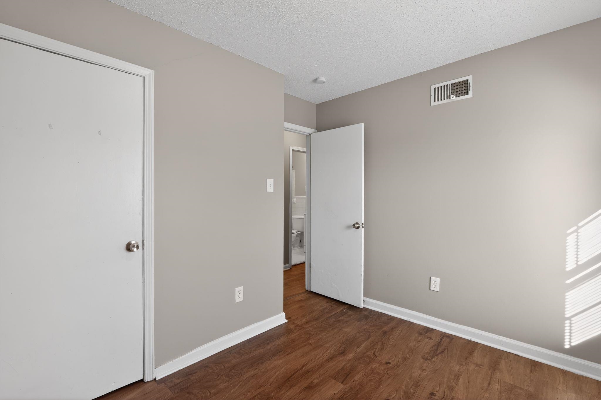 3637 Neely Road Memphis, TN 38109 - Photo 21 of 30 a view of an empty room with closet and a window