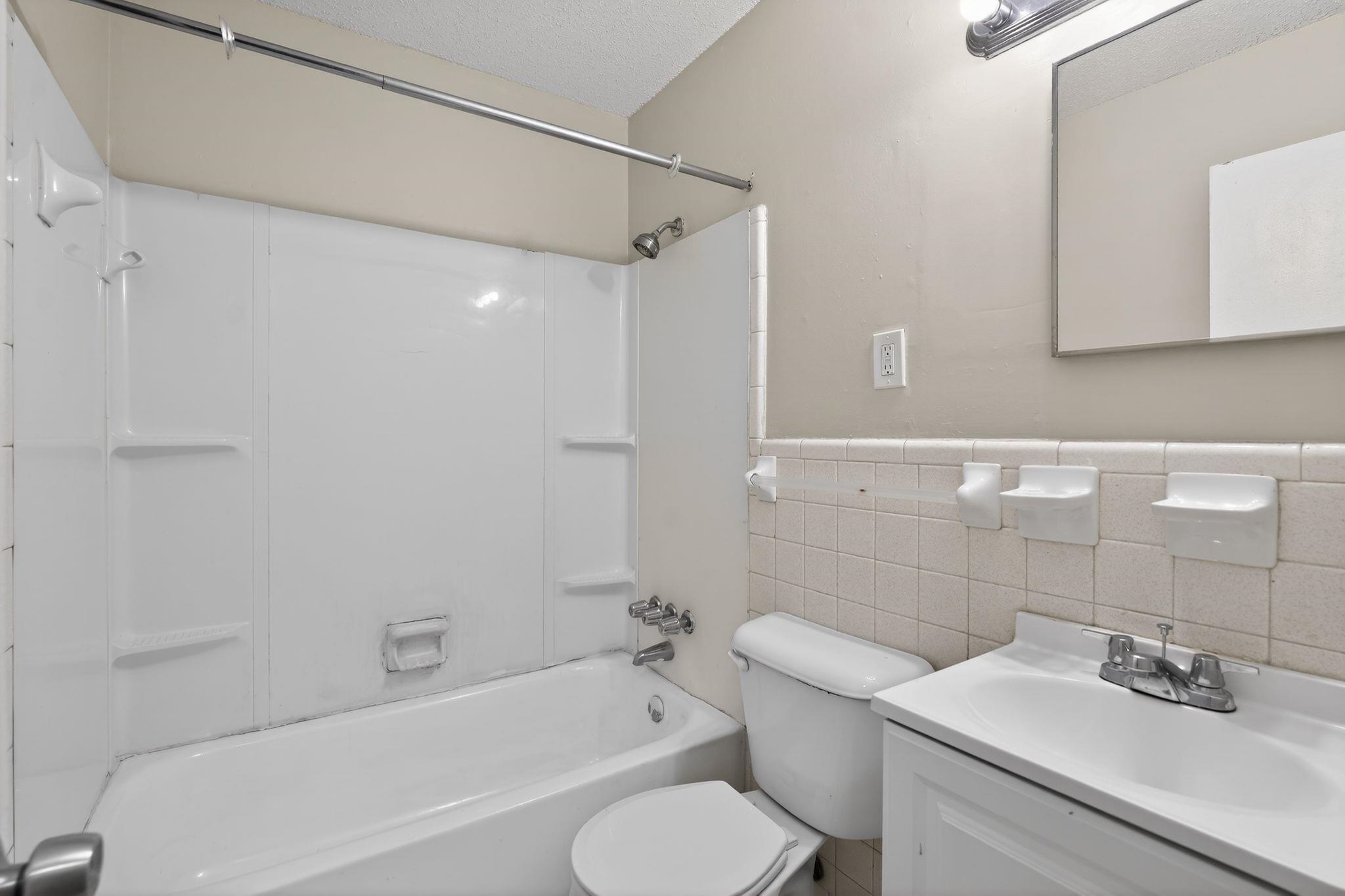 3637 Neely Road Memphis, TN 38109 - Photo 23 of 30 a bathroom with a sink toilet and shower