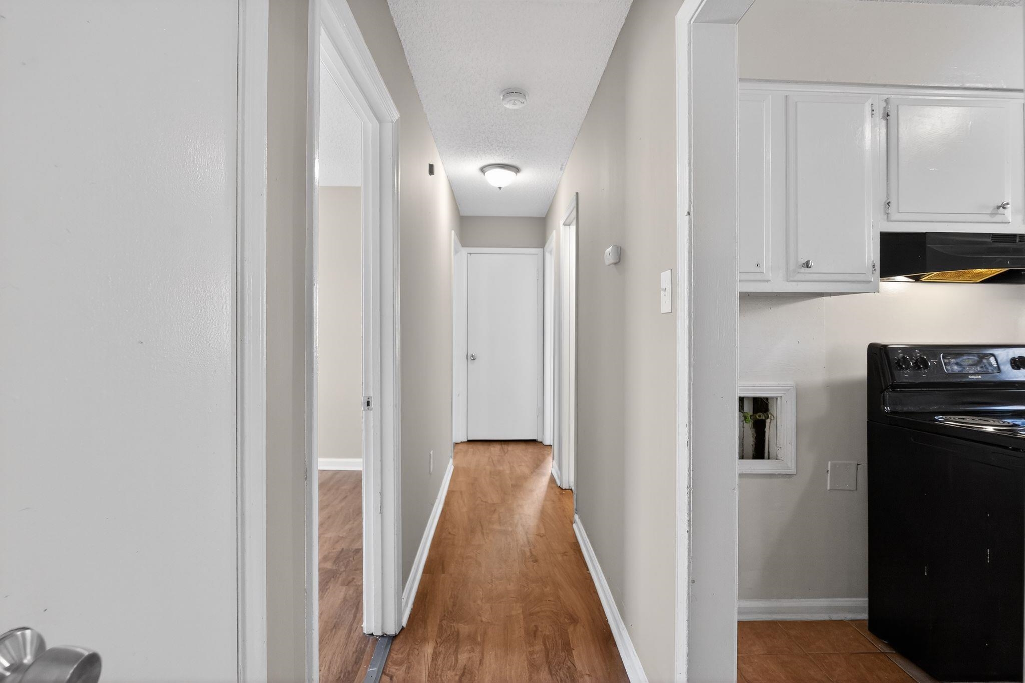3637 Neely Road Memphis, TN 38109 - Photo 25 of 30 a view of a kitchen from the hallway