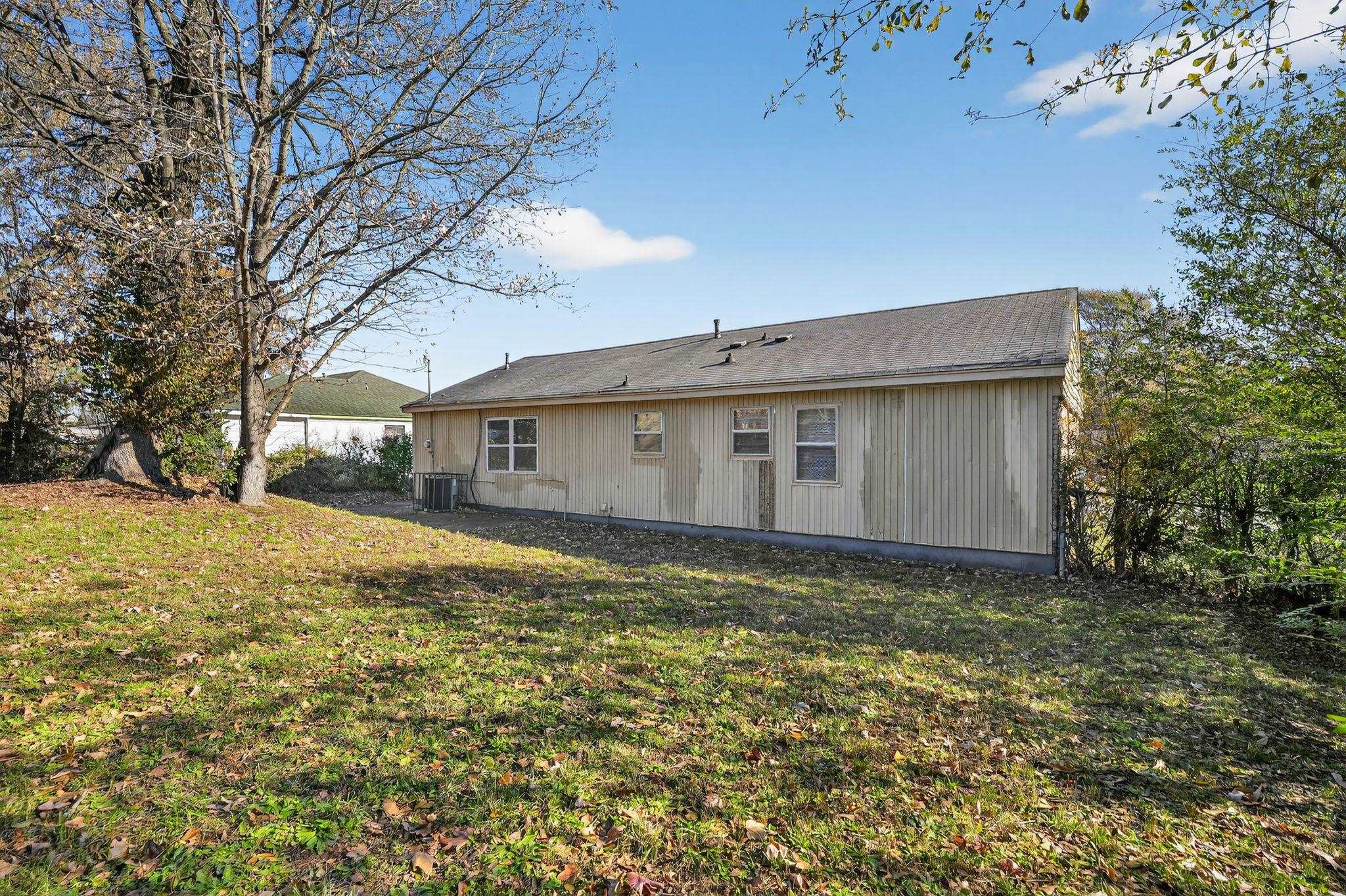 3637 Neely Road Memphis, TN 38109 - Photo 29 of 30 a view of a house with a yard