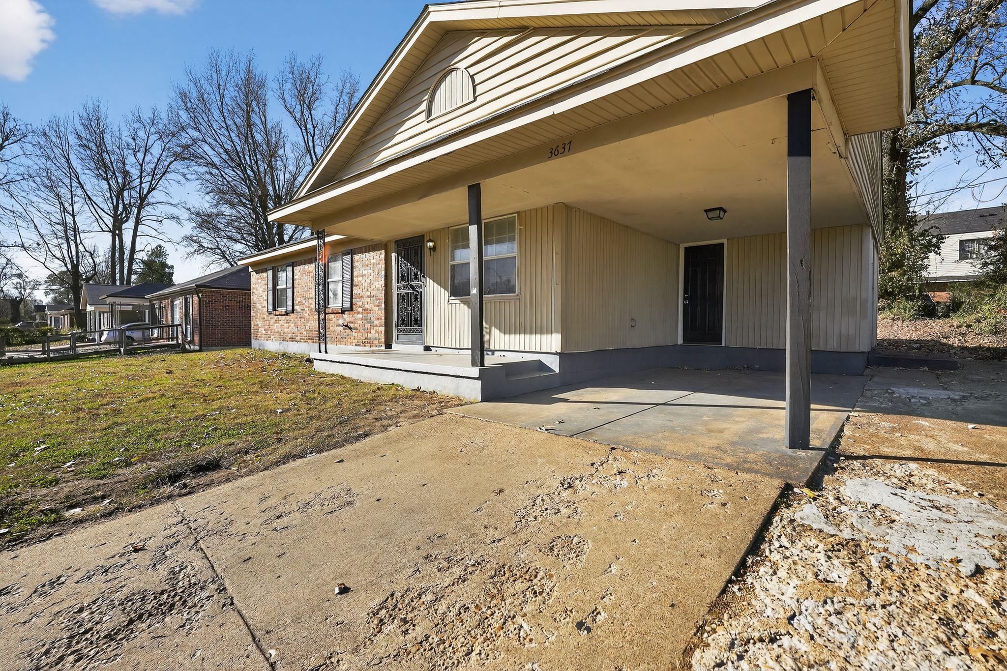 3637 Neely Road Memphis, TN 38109 - Photo 4 of 30 a view of a house with snow on the road