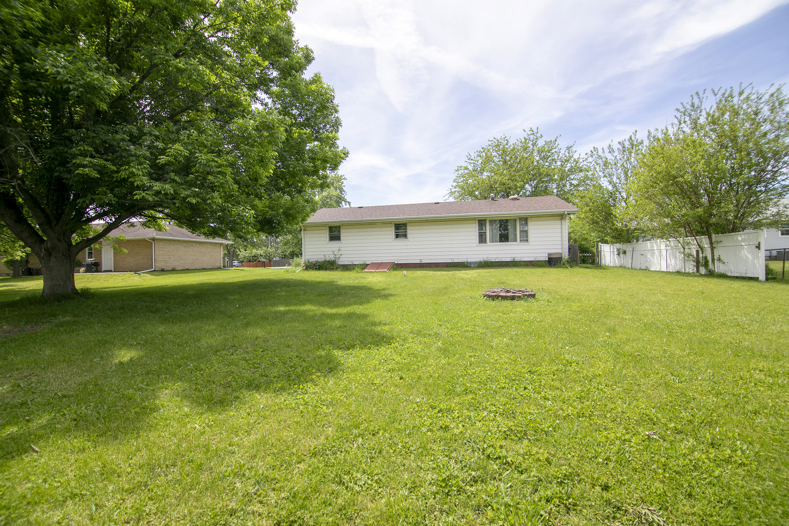 1572 North 2000E Road Bourbonnais, IL 60914 - Photo 17 of 18 a view of a house with a yard porch and sitting area