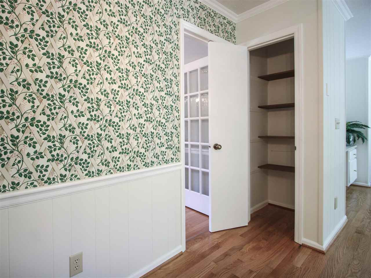 1324 Kingston Ridge Road Cary, NC 27511 - Photo 9 of 30 Shown here is the pantry. It has wood shelving. Pantry