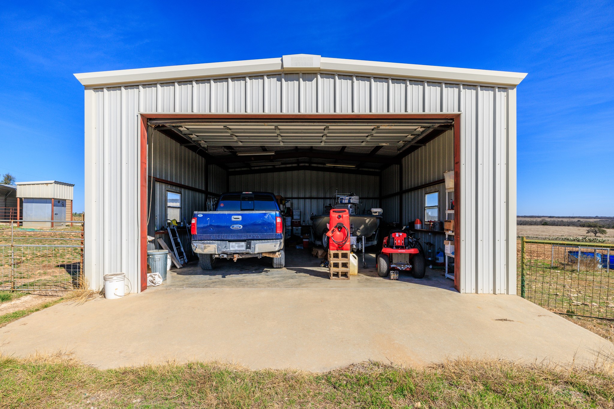 2020 Wendel Road Harper, TX 78631 - Photo 28 of 40 a view of car parked in garage
