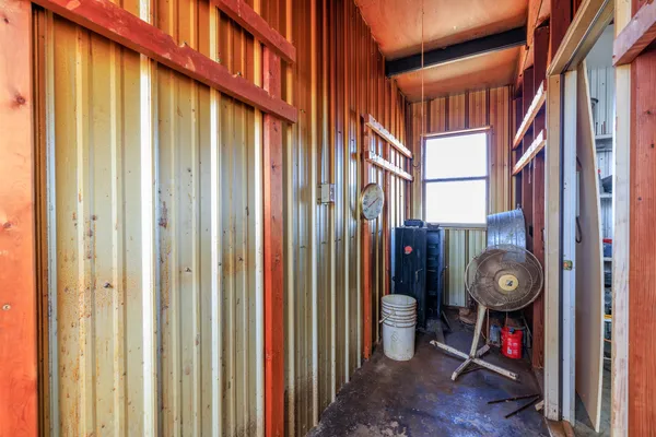 a view of an entryway with wooden floor and stairs