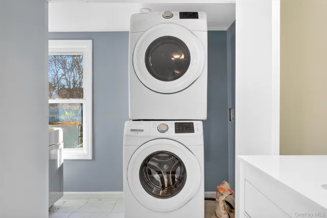 a utility room with dryer and washer