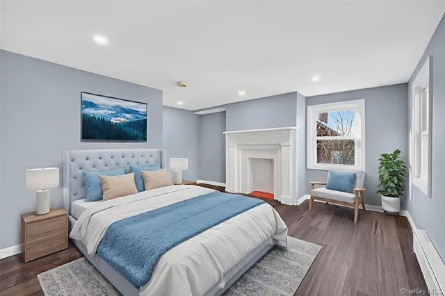 a spacious bedroom with a large bed and a couch