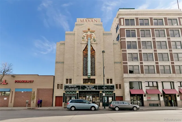 a car parked in front of a building