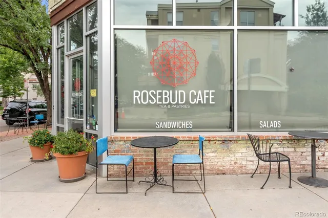 a outdoor area with table and chairs
